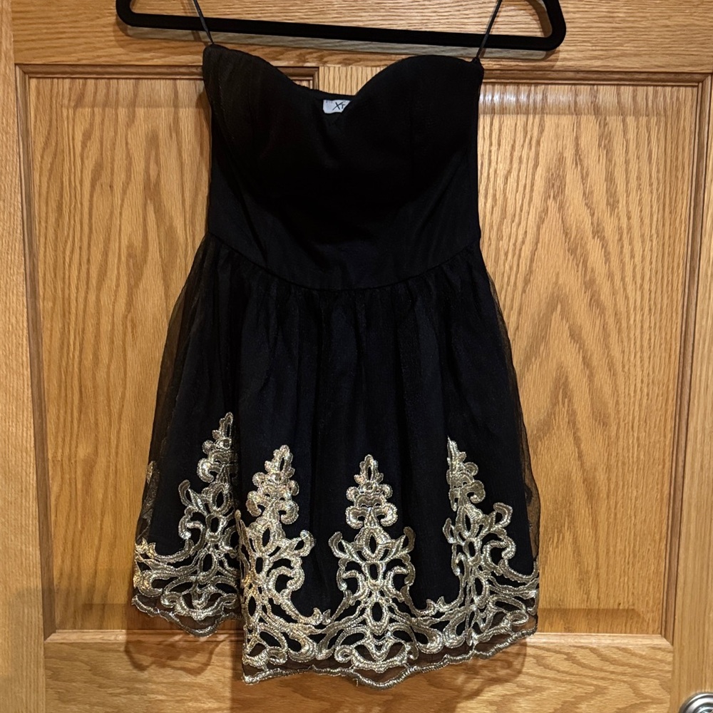 Xtaren Black and Gold Strapless Dress